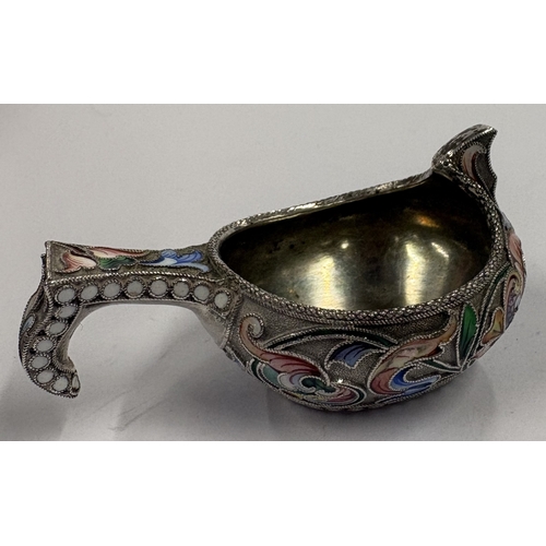 238 - A 19th Century / early 20th Century Russian silver and enamelled kovsh. Marked to base. Approx. 40 g... 