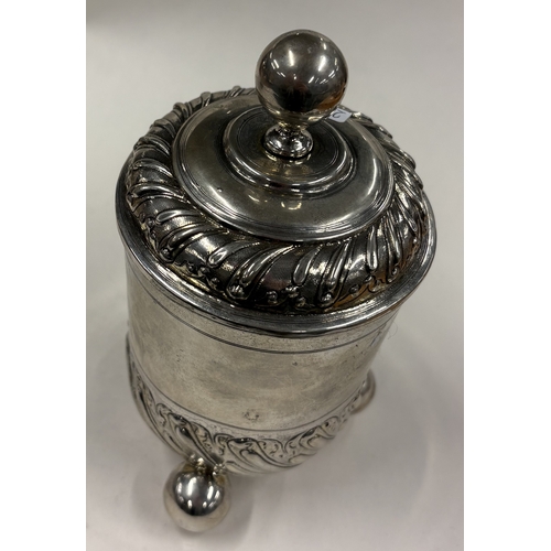 289 - AUGSBURG: An 18th Century German silver beaker and cover. Fully marked to base. Circa 1770. Approx. ... 