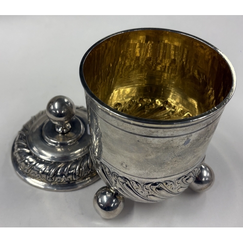 289 - AUGSBURG: An 18th Century German silver beaker and cover. Fully marked to base. Circa 1770. Approx. ... 