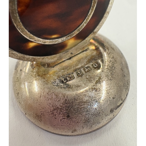 53 - A cased set of four novelty silver and tortoiseshell menu holders. Birmingham 1909. By Levi & Salama... 