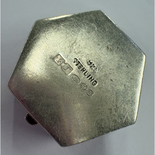 194 - An octagonal silver pill box with hinged cover, bearing English import marks. Approx. 6 grams. Est. ... 
