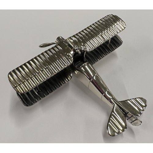 196 - A Continental silver model of an aeroplane. Approx. 111 grams. Est. £250 - £300.