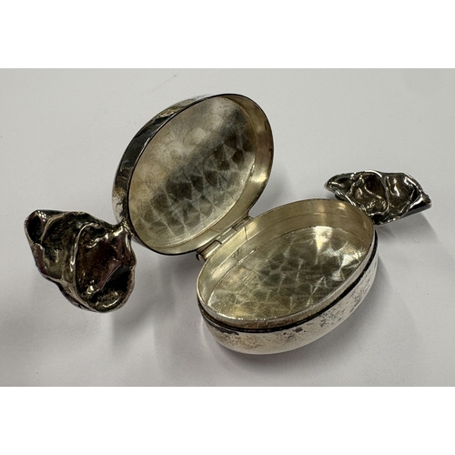 200 - A silver pill box in the form of a sweet. Marked 925. Approx. 11 grams. Est. £20 - £30.