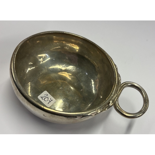 207 - An 18th Century French silver wine taster. Approx. 80 grams. Est. £200 - £300.