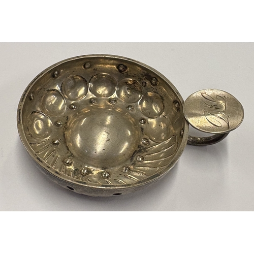 209 - A 19th Century French silver wine taster decorated with original owner's initials to handle. Approx.... 