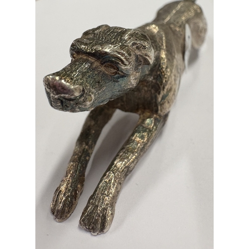 210 - A Victorian silver figure of a hound. London 1890. Approx. 126 grams. Est. £300 - £400.