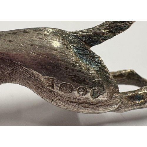 210 - A Victorian silver figure of a hound. London 1890. Approx. 126 grams. Est. £300 - £400.