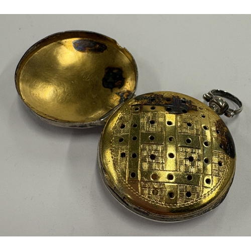 214 - An oval George III silver vinaigrette in the form of a watch case. Birmingham 1804. By Samuel Pember... 