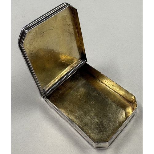 215 - A rare Georgian silver snuff box with flush-fitting cover engraved with scroll decoration, with cut ... 