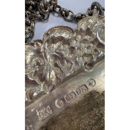 222 - A Victorian silver wine label for 'Whiskey'. Birmingham 1876. By Cohen Charles. Approx. 10 grams. Es... 