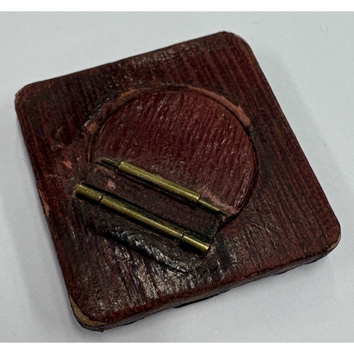 225 - A chased silver frame. Approx. 11 grams. Est. £30 - £40.