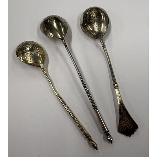 231 - Three Russian silver spoons with engraved decoration. Approx. 48 grams. Est. £50 - £80.