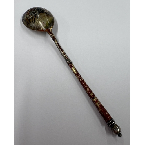 232 - A Russian silver and enamelled spoon. Approx. 11 grams. Est. £40 - £60.