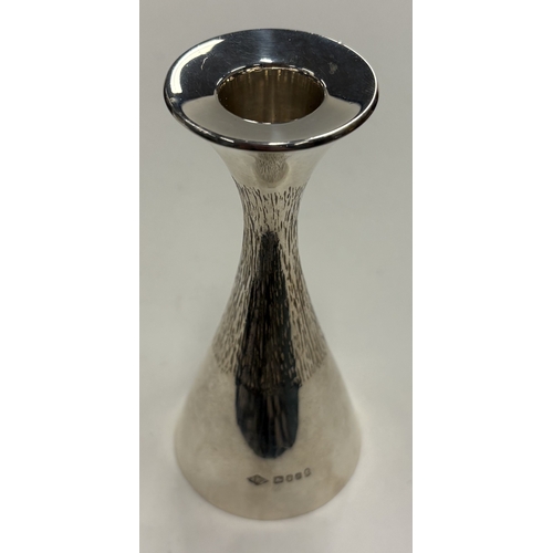 234 - A modernistic silver candlestick with bark decoration. London 1977. By Richard Geere. Approx. 114 gr... 