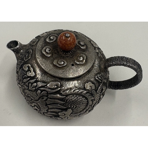 237 - A Chinese metal teapot, marked to base. Est. £200 - £300.