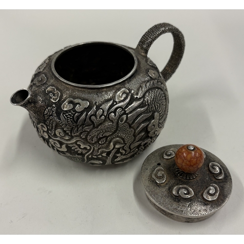 237 - A Chinese metal teapot, marked to base. Est. £200 - £300.