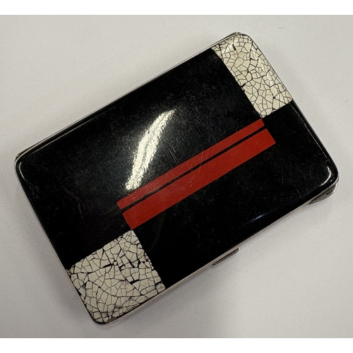 424 - A silver and red and white enamelled cigarette case, bearing import marks. Approx. 117 grams. Est. £... 