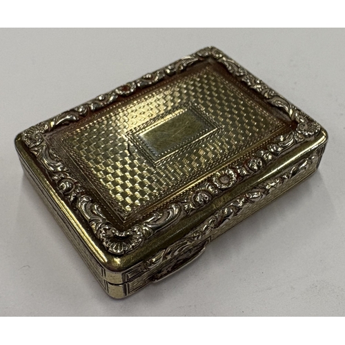 428 - A large George III silver-gilt vinaigrette. London 1829. By IJ. Approx. 32 grams. Est. £250 - £300.