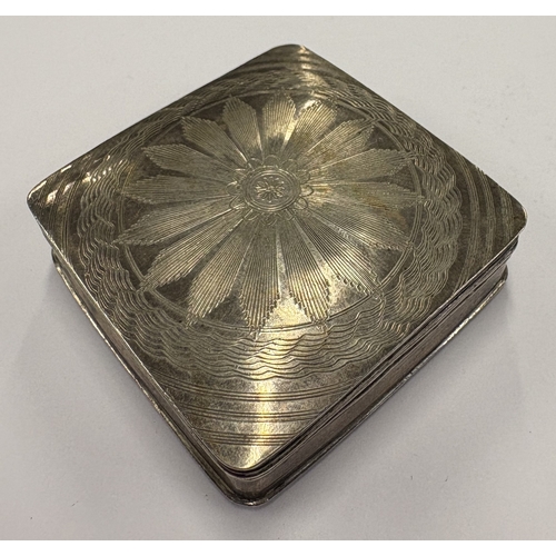 431 - A 19th Century Dutch silver pill box with engraved decoration. Approx. 27 grams. Est. £60 - £80.