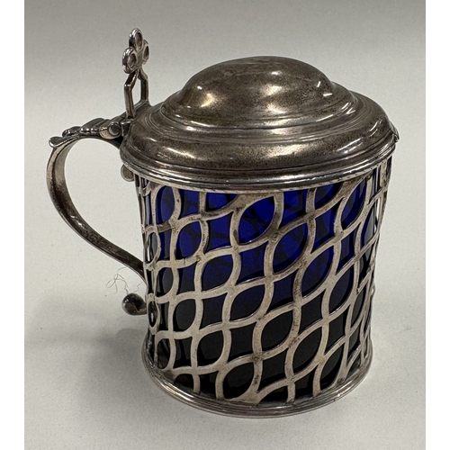 434 - An 18th Century silver mustard pot with pierced decoration, fully marked to base. London 1770. Appro... 