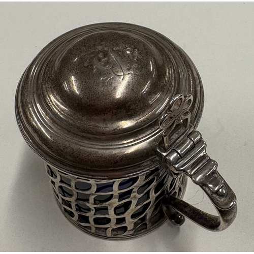 434 - An 18th Century silver mustard pot with pierced decoration, fully marked to base. London 1770. Appro... 
