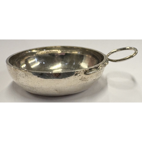 442 - An early-19th Century French silver wine taster. Circa 1810. Approx. 44 grams. Est. £200 - £300.