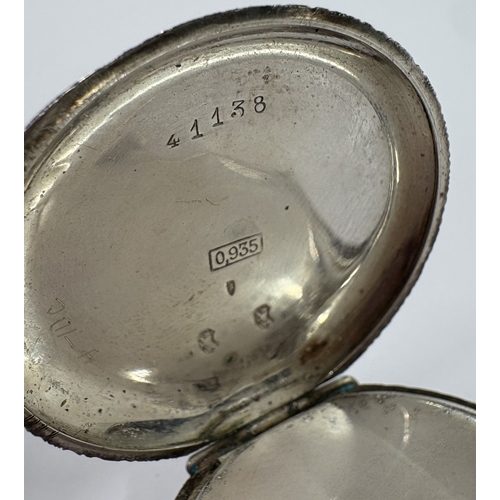 450 - A silver-mounted fob watch with white enamelled dial. Approx. 35 grams. Est. £20 - £30.