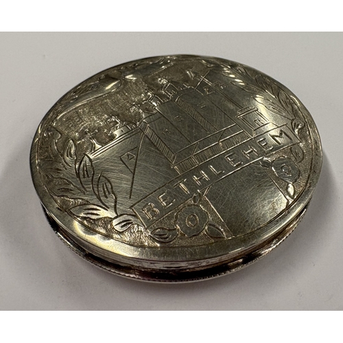 452 - A Continental silver box with hinged cover engraved with scene of Bethlehem. Marked 833. Approx. 21 ... 