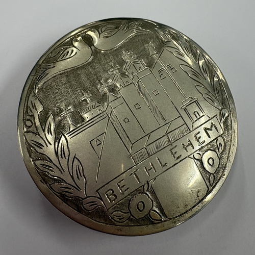 452 - A Continental silver box with hinged cover engraved with scene of Bethlehem. Marked 833. Approx. 21 ... 