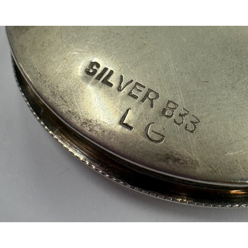 452 - A Continental silver box with hinged cover engraved with scene of Bethlehem. Marked 833. Approx. 21 ... 