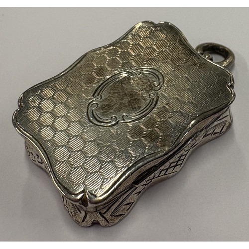 459 - A Victorian silver vinaigrette. Birmingham 1857. By Nathaniel Mills. Approx. 20 grams. Est. £150 - £... 