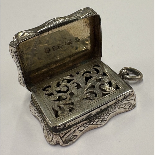 459 - A Victorian silver vinaigrette. Birmingham 1857. By Nathaniel Mills. Approx. 20 grams. Est. £150 - £... 