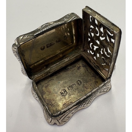459 - A Victorian silver vinaigrette. Birmingham 1857. By Nathaniel Mills. Approx. 20 grams. Est. £150 - £... 