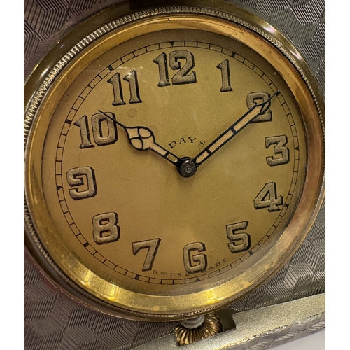 461 - A heavy silver combination clock and cigarette case with engine-turned decoration. Birmingham 1928. ... 