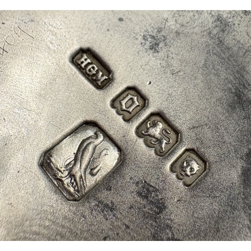 464 - A silver wine taster with 'Tree of Life' decoration to handle. London 1929. By Henry George Murphy. ... 