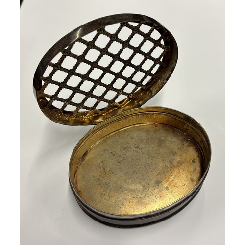 466 - An early 20th Century silver jewellery box with pierced hinged cover. London 1907. By William Comyns... 