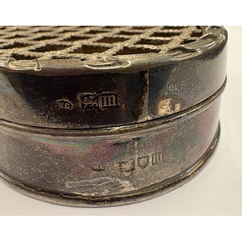 466 - An early 20th Century silver jewellery box with pierced hinged cover. London 1907. By William Comyns... 