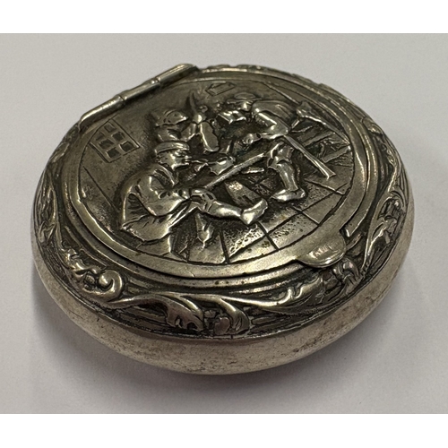 467 - A chased silver snuff box with embossed tavern scene to cover. Approx. 24 grams. Est. £50 - £80.