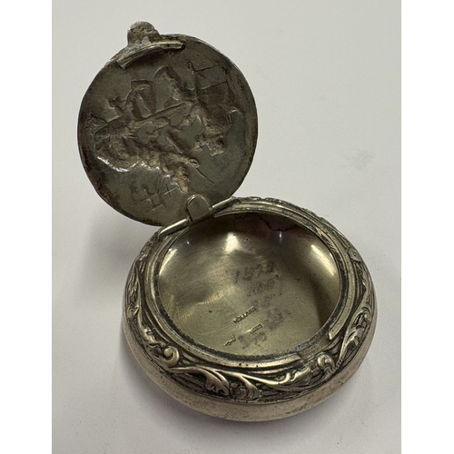 467 - A chased silver snuff box with embossed tavern scene to cover. Approx. 24 grams. Est. £50 - £80.
