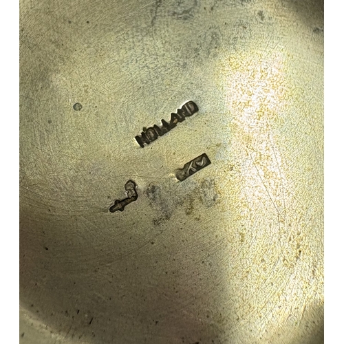 467 - A chased silver snuff box with embossed tavern scene to cover. Approx. 24 grams. Est. £50 - £80.