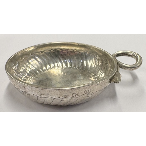 469 - An oversized 18th Century French silver wine taster, fully marked to side. Approx. 100 grams. Est. £... 