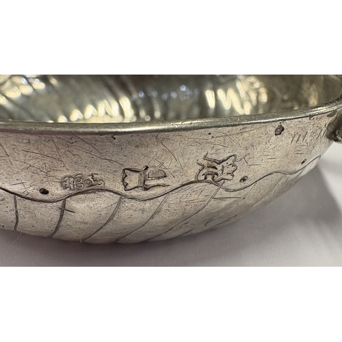 469 - An oversized 18th Century French silver wine taster, fully marked to side. Approx. 100 grams. Est. £... 