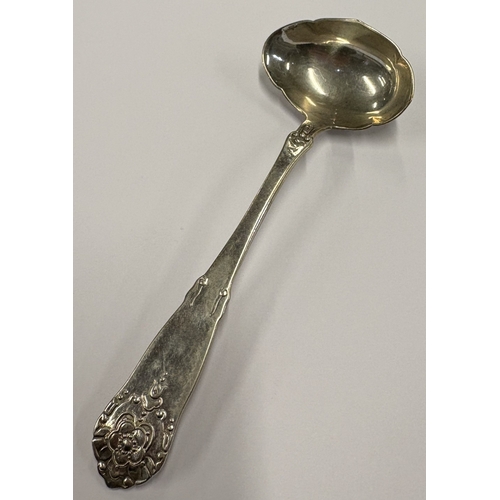 472 - A silver ladle in the George Jensen style. Approx. 30 grams. Est. £60 - £80.