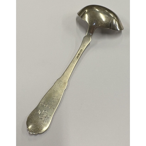 472 - A silver ladle in the George Jensen style. Approx. 30 grams. Est. £60 - £80.