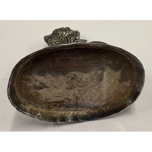 473 - A heavy Continental cast silver figure of a dragon. Approx. 121 grams. Est. £250 - £300.