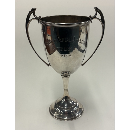 479 - A plain George V silver two-handled cup inscribed 'British Dental Association Southern Cup 1935'. Lo... 