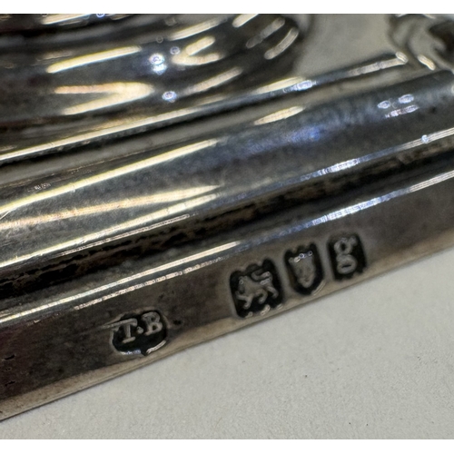 543 - A silver taperstick on square base. London. By TS. Approx. 136 grams of gross weight. Est. £100 - £1... 