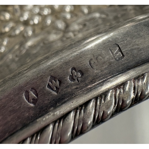 544 - A silver-plated swing-handled basket. Est. £10 - £20.