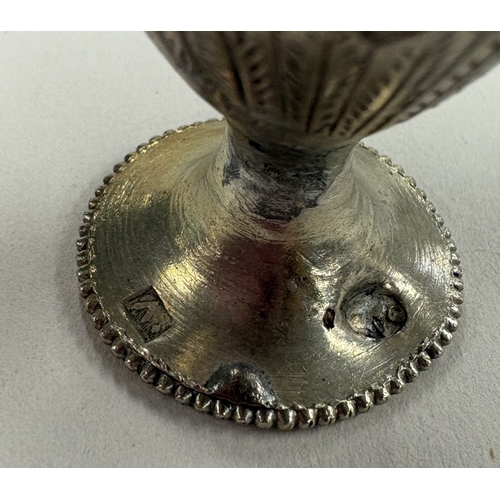 562 - A matched pair of Continental silver goblets with engraved decoration. Approx. 95 grams. Est. £80 - ... 