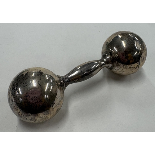 579 - A baby's silver rattle contained within original pouch. By Tiffany & Co. Approx. 53 grams. Est. £50 ... 
